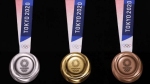 ஒரு இன்ச் கூட அதிகமாகாது.. ஒலிம்பிக் பதக்கத்தில் மறைந்திருக்கும் ரகசியம்.. இதுதான் தயாரிக்கும் முறை 